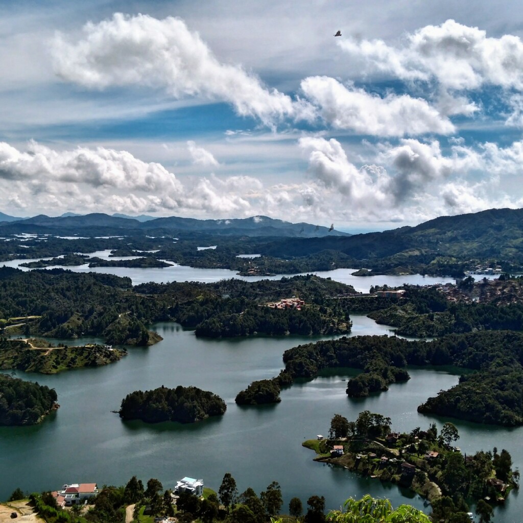 Aerial view of the Guatape reservoir dotted with green islands and inlets