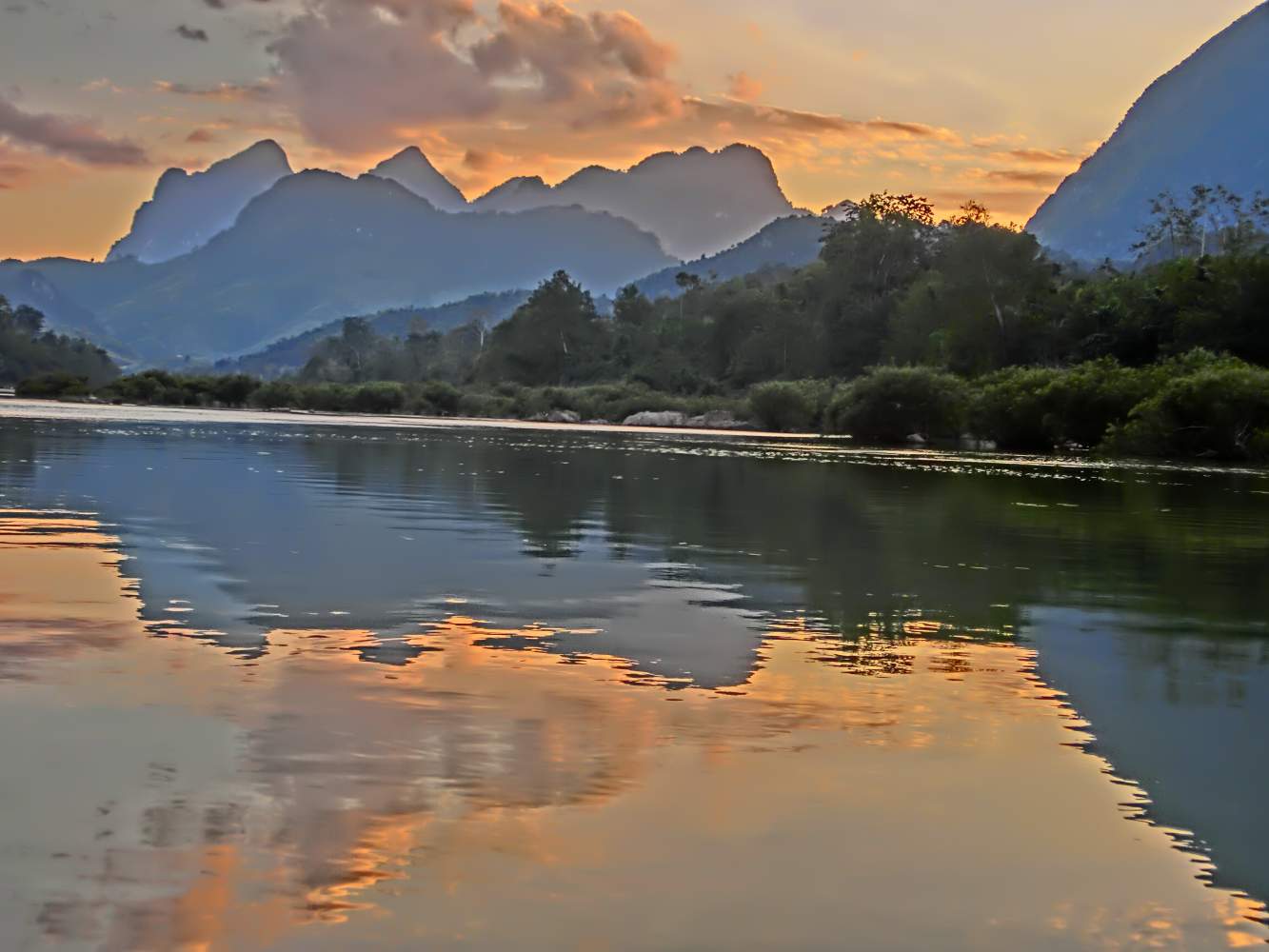 Sonnenuntergang bei der Thailand Motorradreise, Asien